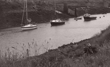 3 boats near the mouth of the Afon Afan
