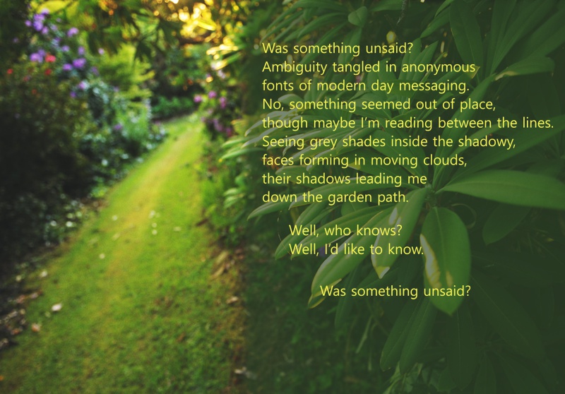 A grassy
        path with high lush bushes on either side, and poem